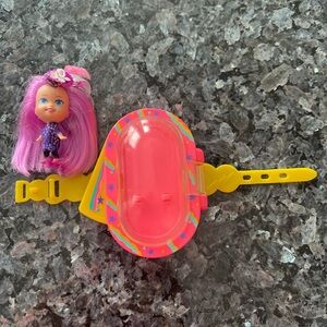 Colorful Doll with Pink Hair and Yellow Accessories